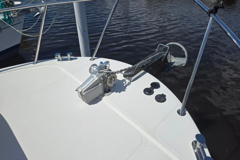 Slide: The Image of Bow of 2012 American Tug 365 Flybridge with anchor and winch system. - 86