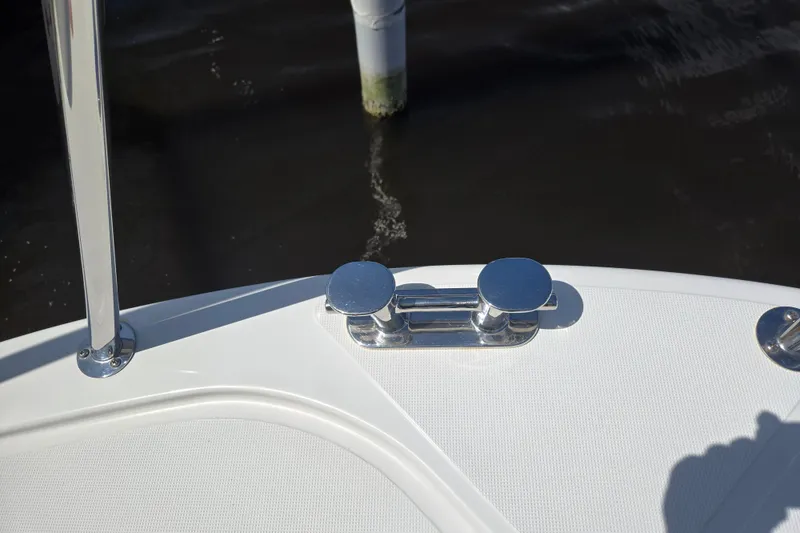 Slide: The Image of Chrome cleat on 2012 American Tug 365 Flybridge boat deck. - 93