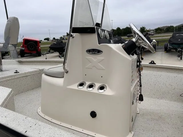 Slide: The Image of 2015 Xpress Boats Hyper-Lift Series H20B console on boat deck. - 11