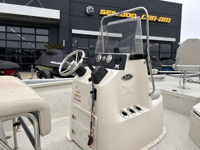 Slide: The Image of 2015 Xpress Boats Hyper-Lift Series H20B console in a showroom. - 6