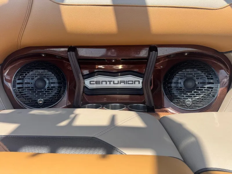 Slide: The Image of 2023 Centurion Ri230 boat speakers and interior design. - 13