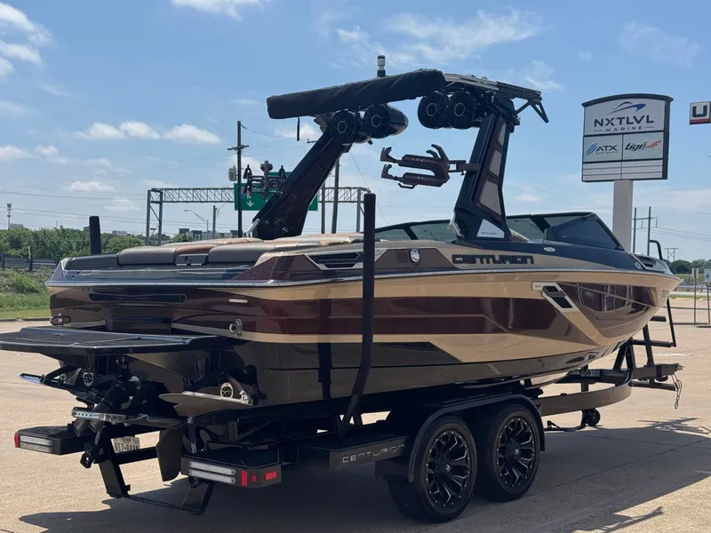 Slide: The Image of 2023 Centurion Ri230 boat on trailer at NXT LVL Marine. - 5