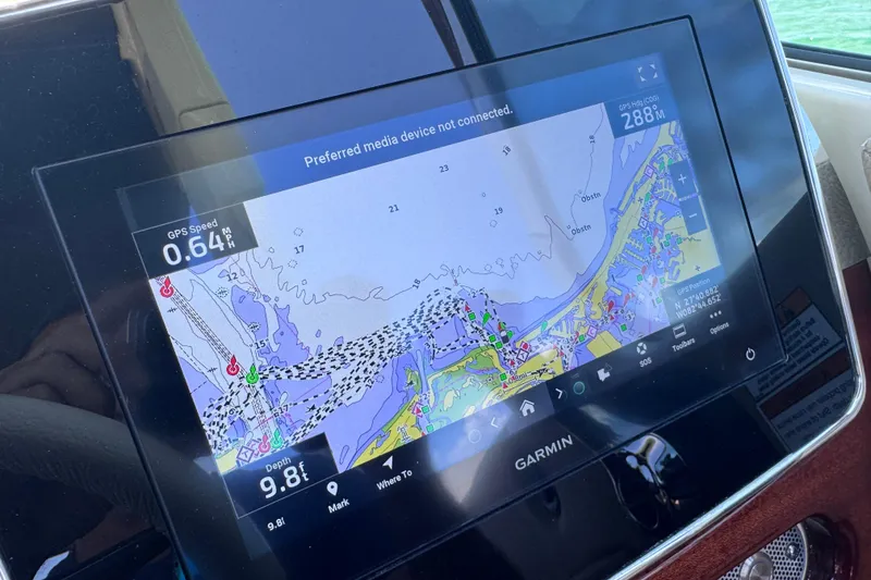 Slide: The Image of Garmin navigation display on 2023 Chris-Craft Launch 25 GT boat, showing map and GPS data. - 39