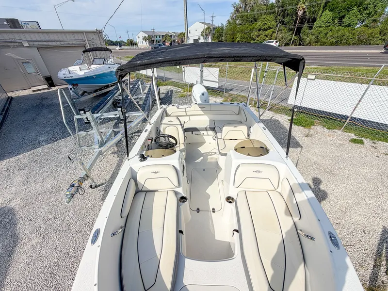 Slide: The Image of 2023 Stingray 172 SC boat with canopy on trailer. - 11