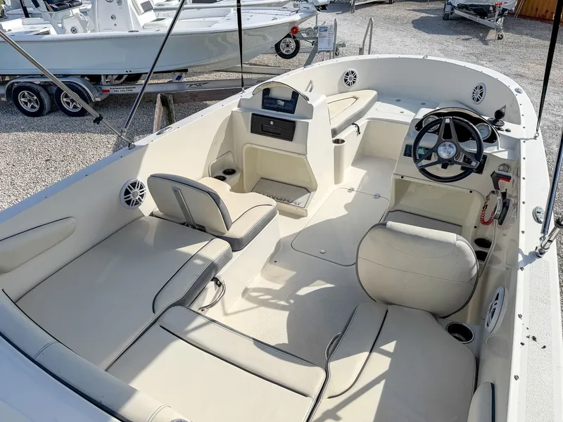 Slide: The Image of Interior of 2023 Stingray 172 SC boat, beige upholstery, modern design. - 6