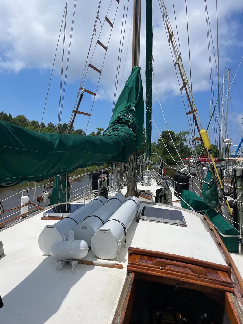 Slide: The Image of Formosa Spindrift 43 sailboat deck with green covers, year 1983. - 12