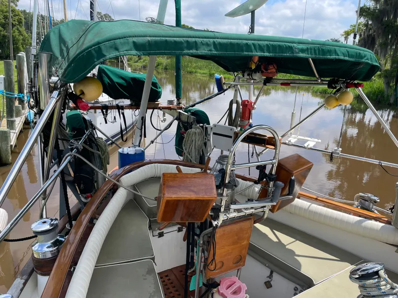 Slide: The Image of Cockpit of a 1983 Formosa Spindrift 43 yacht by the river. - 13