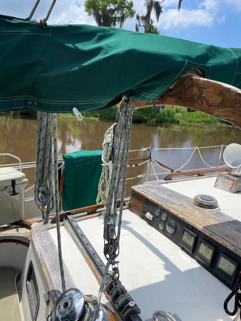 Slide: The Image of Formosa Spindrift 43 sailboat deck with green cover, year 1983. - 18