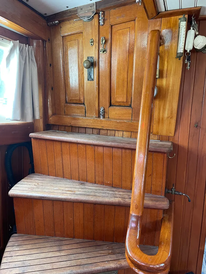 Slide: The Image of Wooden staircase in a 1983 Formosa Spindrift 43 yacht. - 19