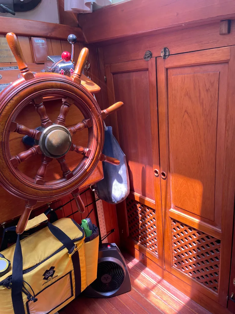 Slide: The Image of Interior of a 1983 Formosa Spindrift 43 yacht with steering wheel. - 21