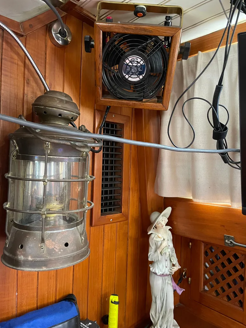 Slide: The Image of Interior of a 1983 Formosa Spindrift 43 yacht with fan and lamp. - 25
