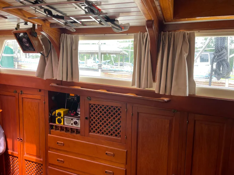 Slide: The Image of Interior of a 1983 Formosa Spindrift 43 yacht with wooden cabinetry. - 27
