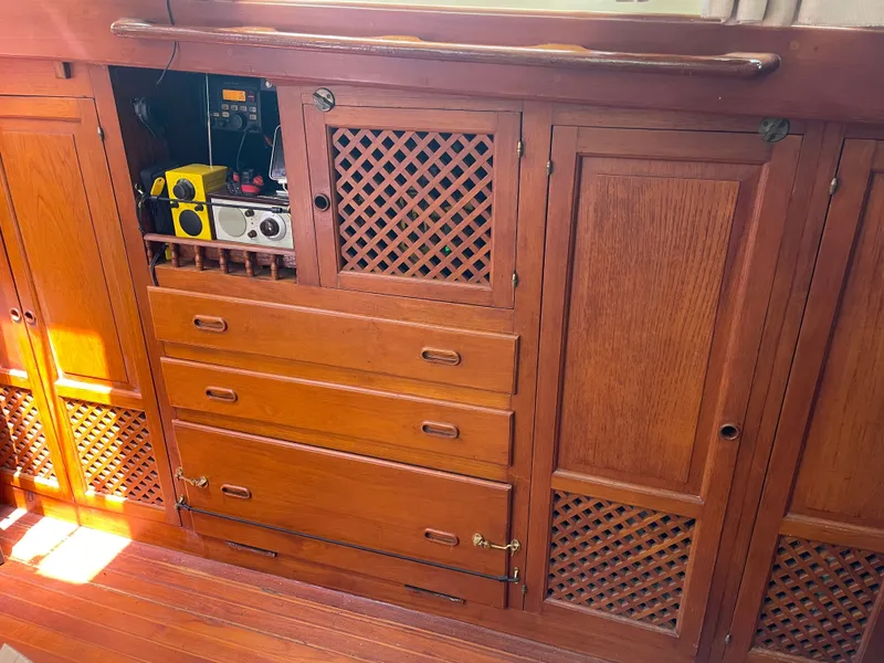 Slide: The Image of Wooden cabinet inside a 1983 Formosa Spindrift 43 yacht. - 28