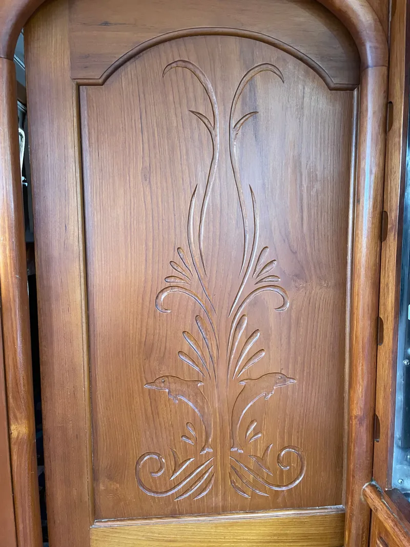 Slide: The Image of Wooden door with carved design on Formosa Spindrift 43, year 1983. - 34