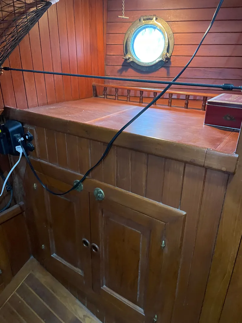 Slide: The Image of Interior of a 1983 Formosa Spindrift 43 yacht with wooden paneling. - 37