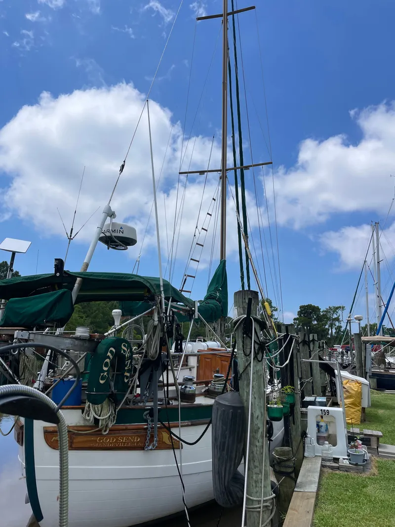 Slide: The Image of 1983 Formosa Spindrift 43 sailboat docked at marina. - 4