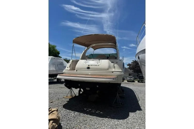 Slide: The Image of Engine compartment of 2002 Sea Ray 360 Sundancer with Mercury engines visible. - 20