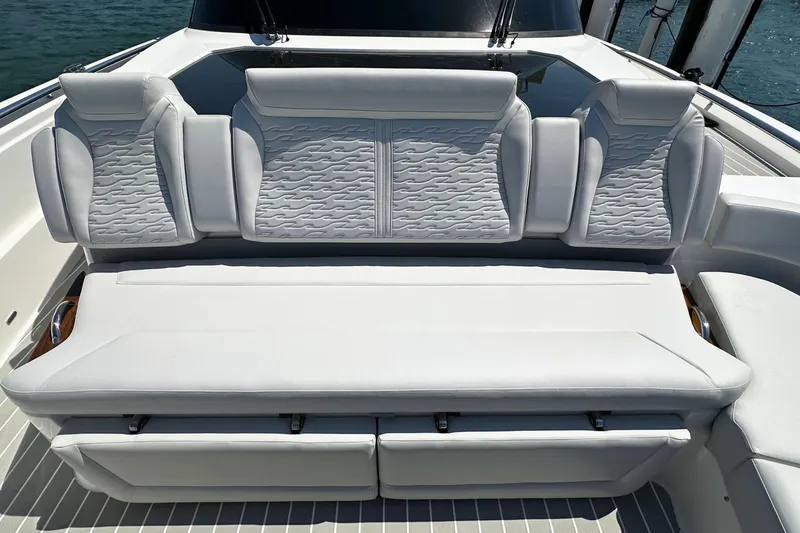 Slide: The Image of Luxurious seating on 2027 Tiara Yachts 56 LS, featuring elegant white upholstery. - 37