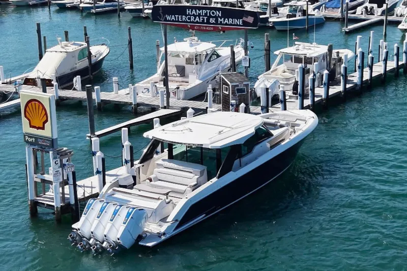 Slide: The Image of 2027 Tiara Yachts 56 LS docked at Hampton Watercraft & Marine marina. - 5