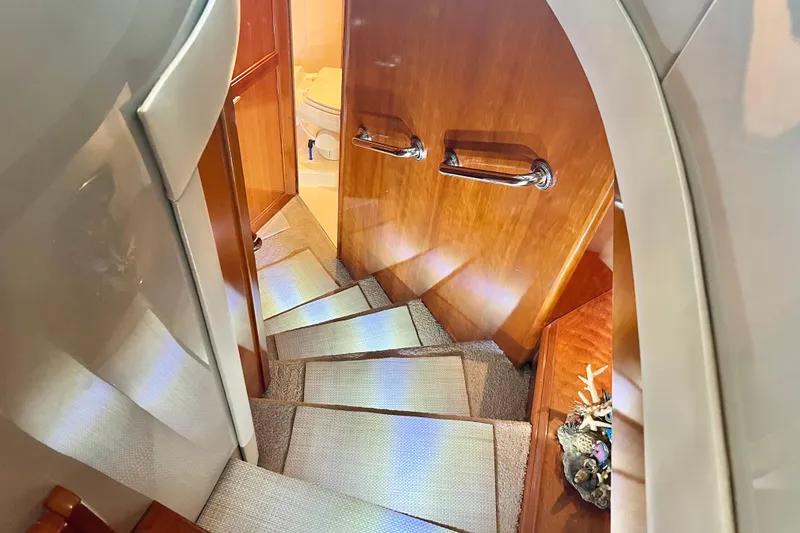 Slide: The Image of Staircase leading to bathroom in 2005 Carver 56 Voyager yacht interior. - 21