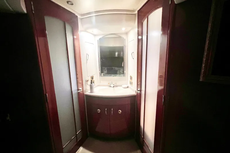 Slide: The Image of Luxurious bathroom interior of 2005 Carver 56 Voyager yacht with elegant wood finishes. - 28