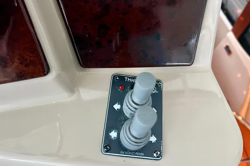 Slide: The Image of Control panel of a 2005 Carver 56 Voyager yacht with Volvo Penta thruster controls. - 36
