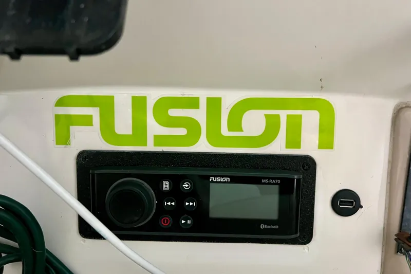 Slide: The Image of Fusion MS-RA70 stereo system on 2005 Carver 56 Voyager yacht dashboard. - 38