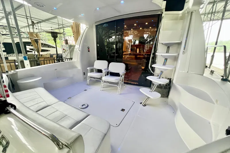 Slide: The Image of Luxurious 2005 Carver 56 Voyager yacht interior with seating and modern design. - 4