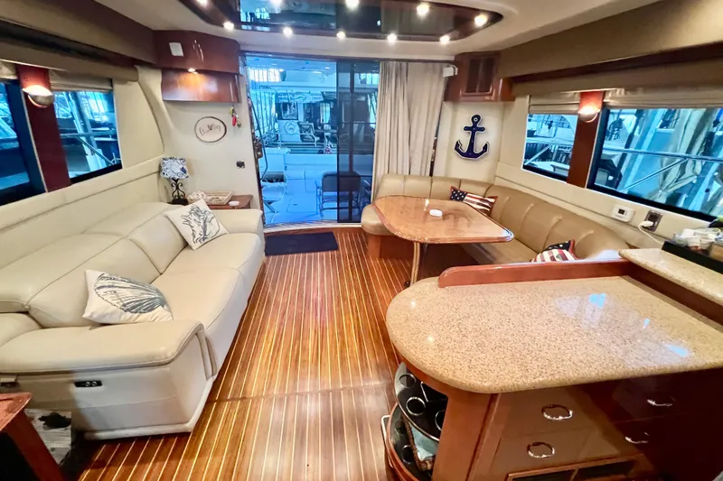 Slide: The Image of Luxurious interior of a 2005 Carver 56 Voyager yacht with elegant seating and decor. - 6