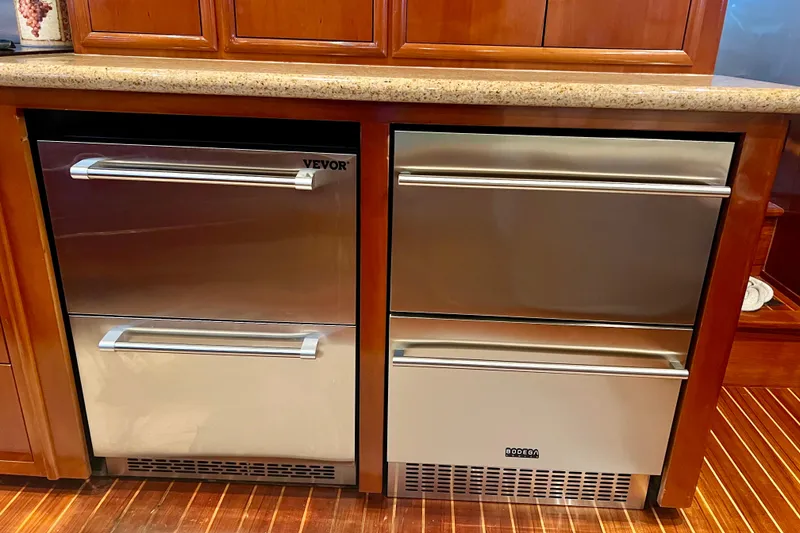 Slide: The Image of Stainless steel drawers in a 2005 Carver 56 Voyager yacht kitchen. - 9