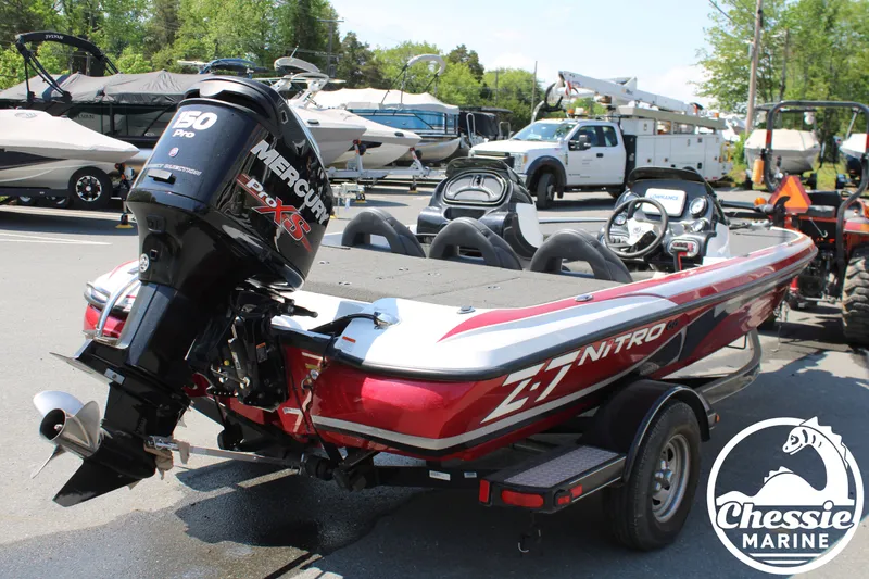 Slide: The Image of 2015 Tracker NITRO Z7 boat with Mercury engine outdoors. - 5