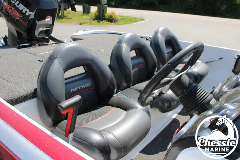 Slide: The Image of 2015 Tracker NITRO Z7 boat with steering wheel and seats. - 9