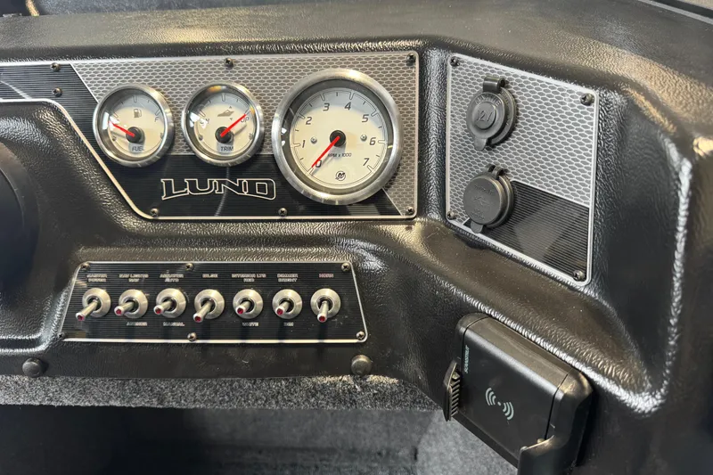 Slide: The Image of Dashboard of 2026 Lund 1875 Crossover XS boat with gauges and controls. - 6