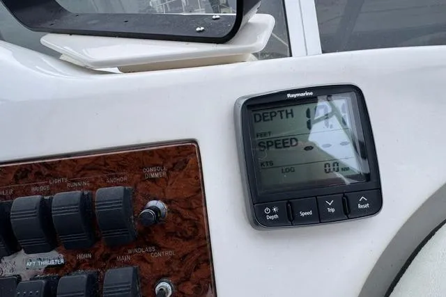 Slide: The Image of Control panel of a 1999 Sea Ray 420 Aft Cabin with Raymarine display. - 25
