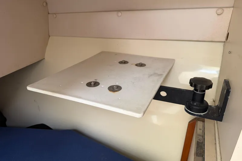 Slide: The Image of Adjustable shelf inside a 2000 Albin 28 Tournament Express boat cabin. - 18