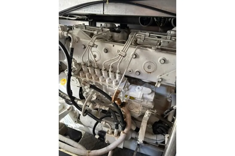 Slide: The Image of Engine of 2004 Carver 396 Motor Yacht with visible wiring and components. - 15