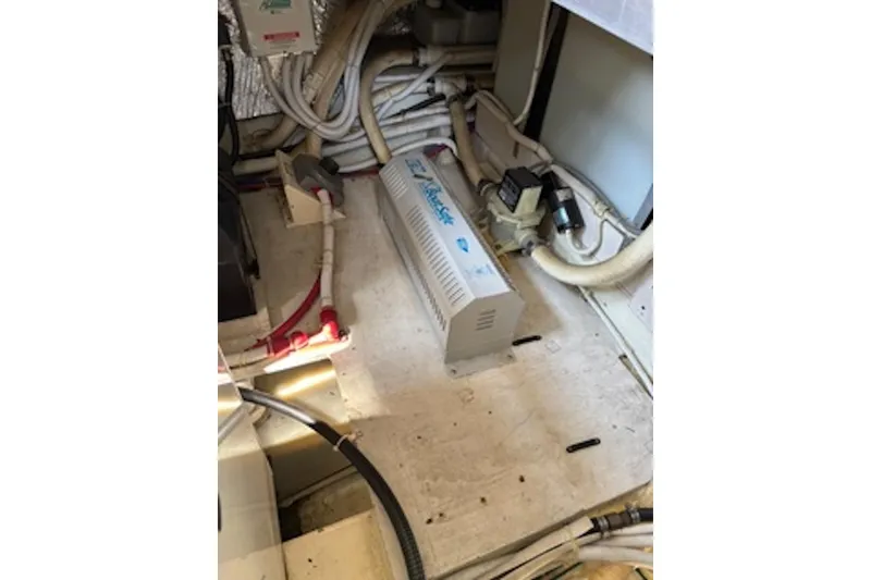 Slide: The Image of Engine room of 2004 Carver 396 Motor Yacht with wiring and equipment. - 18