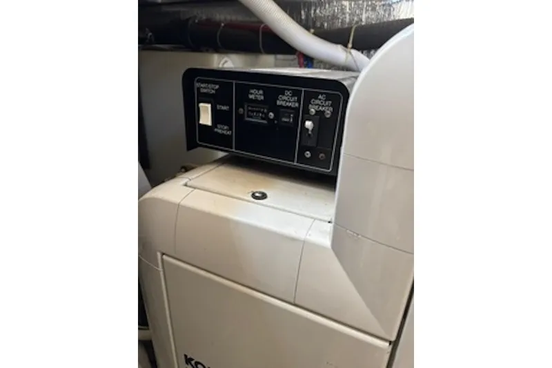 Slide: The Image of Control panel of a 2004 Carver 396 Motor Yacht generator system. - 22