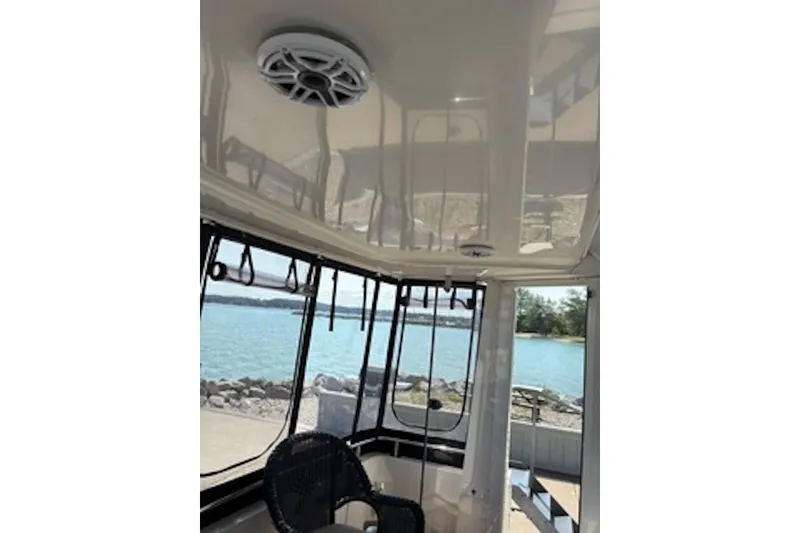 Slide: The Image of Interior view of 2004 Carver 396 Motor Yacht with lake backdrop. - 6