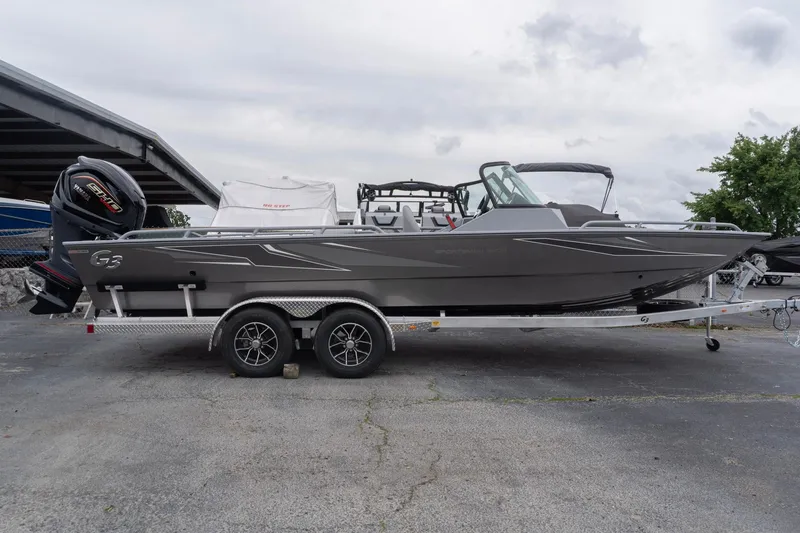 Slide: The Image of 2026 G3 Sportsman 2400 boat on trailer, featuring sleek design and powerful engine. - 1