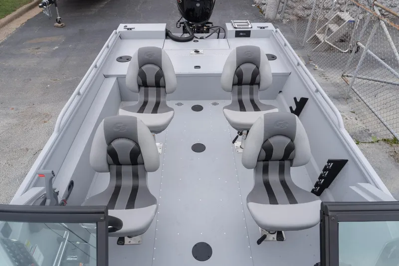 Slide: The Image of 2026 G3 Sportsman 2400 boat interior with four cushioned seats and modern design. - 16