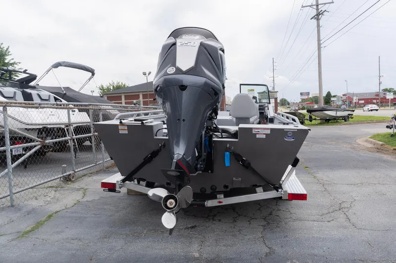 Slide: The Image of 2026 G3 Sportsman 2400 boat with powerful outboard motor, parked outdoors. - 3