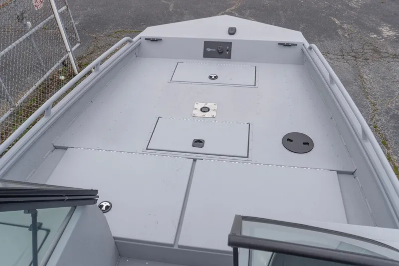 Slide: The Image of 2026 G3 Sportsman 2400 boat deck, featuring storage compartments and sleek design. - 9