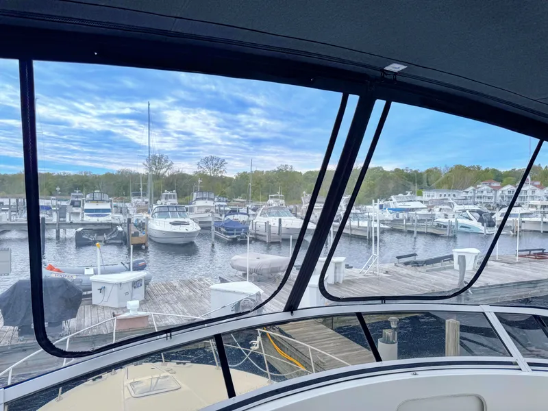 Slide: The Image of View from Carver 406 Aft Cabin Yacht overlooking marina. - 10