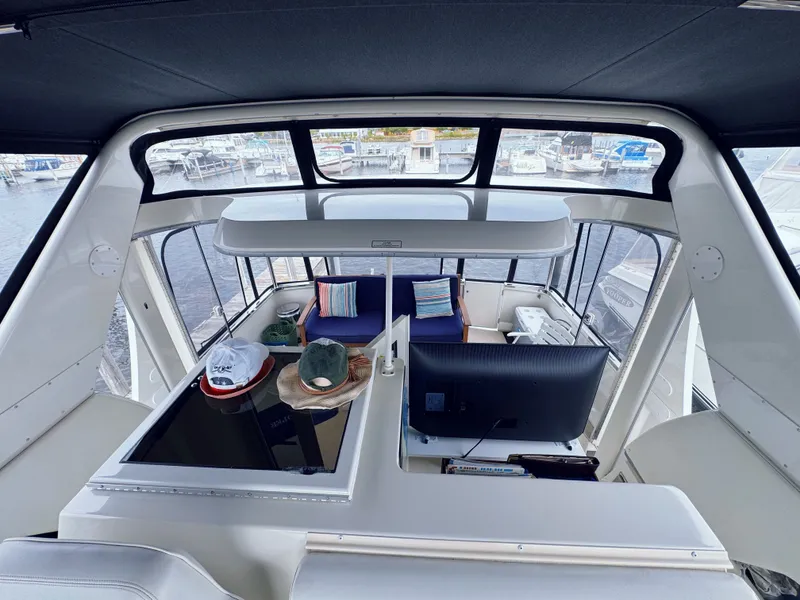 Slide: The Image of Interior view of 1999 Carver 406 Aft Cabin Yacht in harbor. - 17