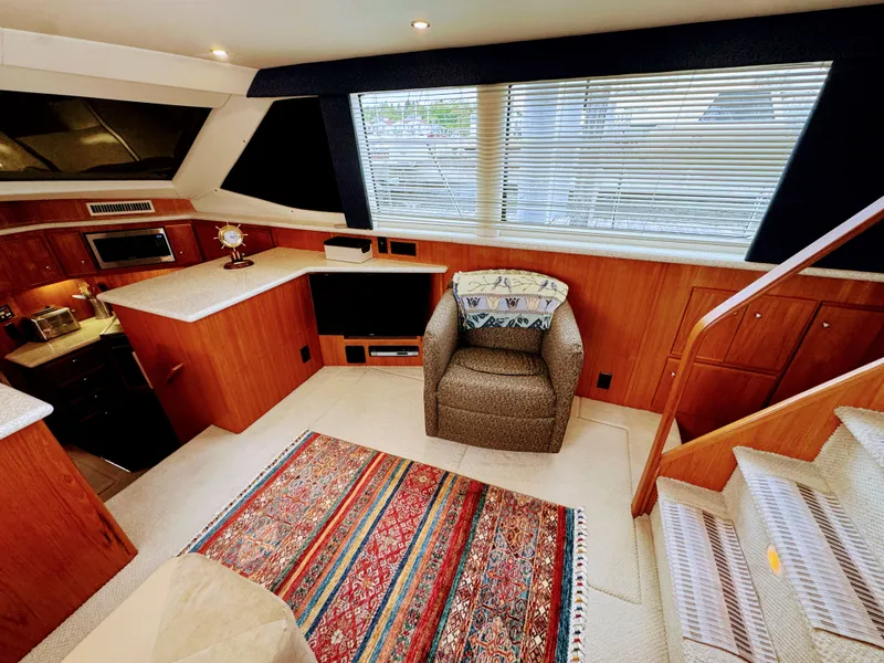 Slide: The Image of Interior of 1999 Carver 406 Aft Cabin Yacht, cozy and stylishly furnished. - 30