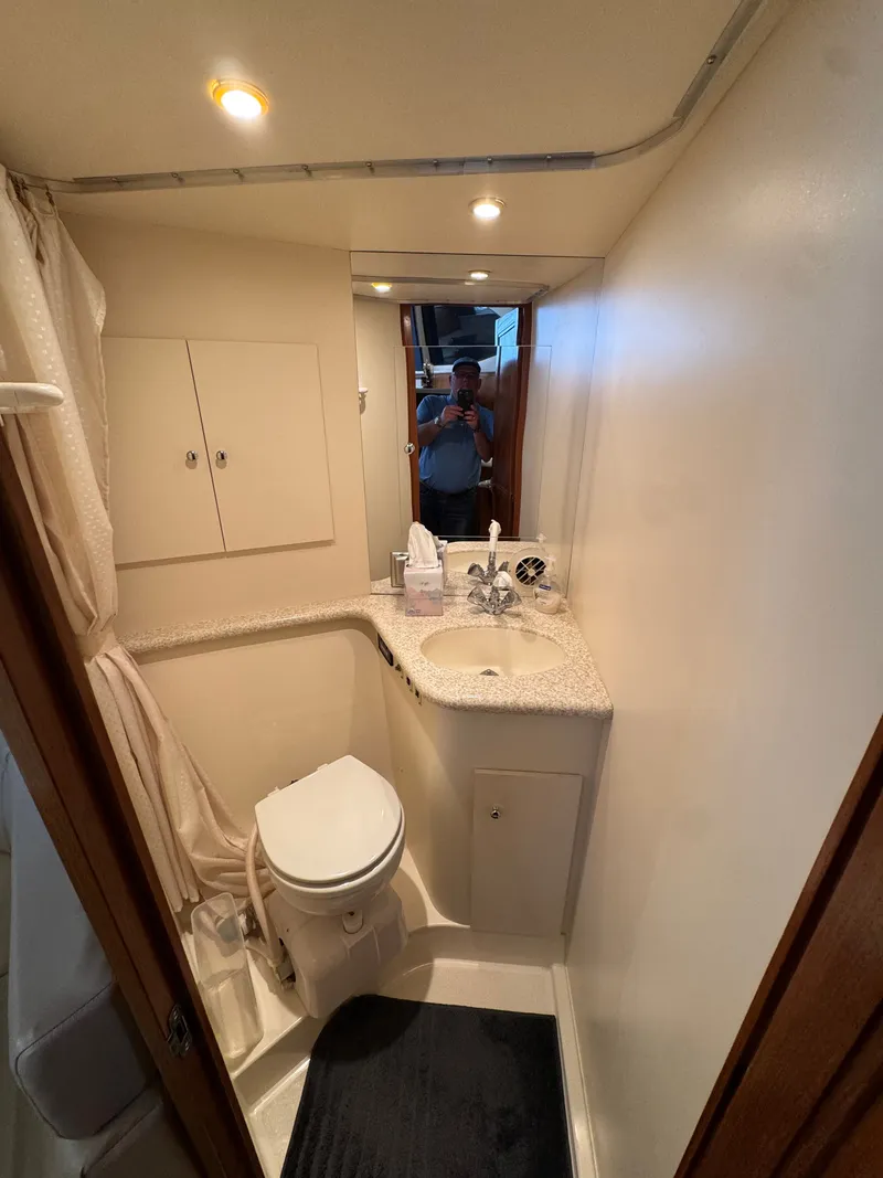 Slide: The Image of Bathroom of the 1999 Carver 406 Aft Cabin Motor Yacht. - 39