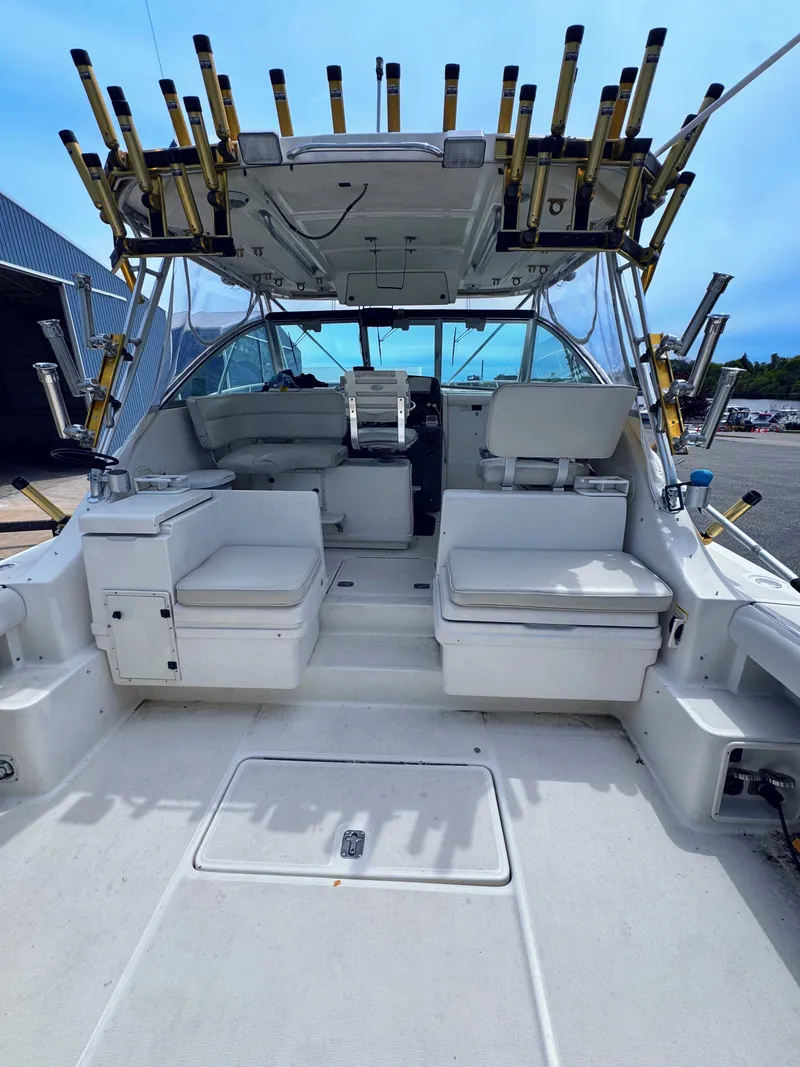 Slide: The Image of Interior view of a 1999 Pursuit 3400 Express boat. - 10