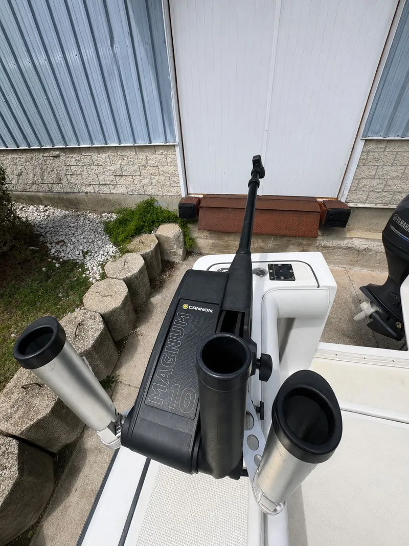 Slide: The Image of Cannon Magnum 10 on Pursuit 3400 Express boat, year 1999. - 13
