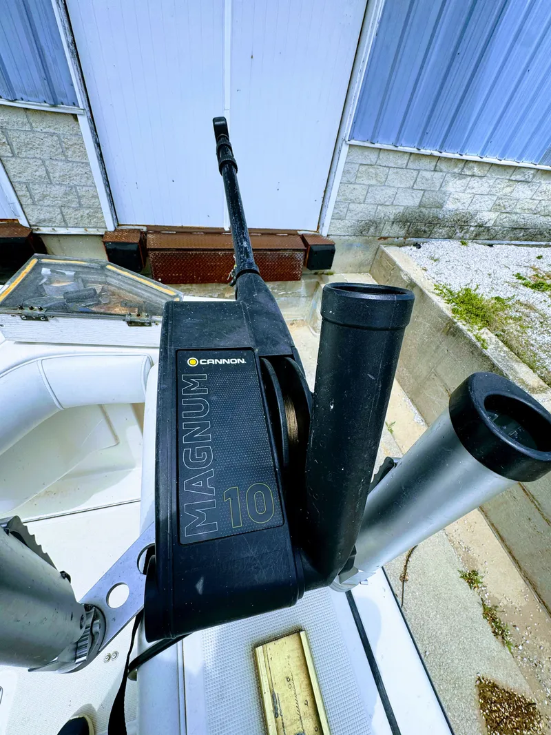 Slide: The Image of Cannon Magnum 10 on Pursuit 3400 Express boat, year 1999. - 14